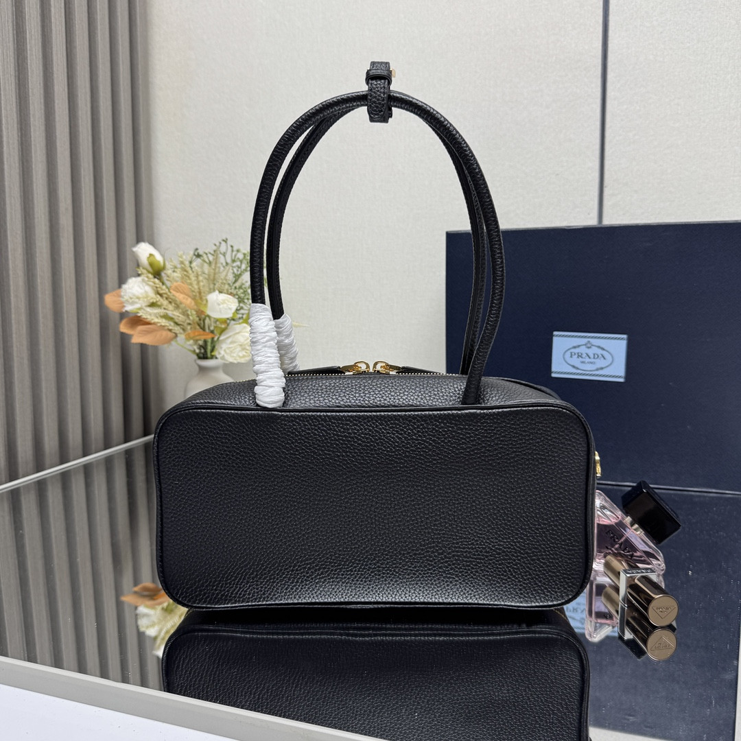 Pra*a medium top handle bag in vitello dino soft leather 13x28x8cm