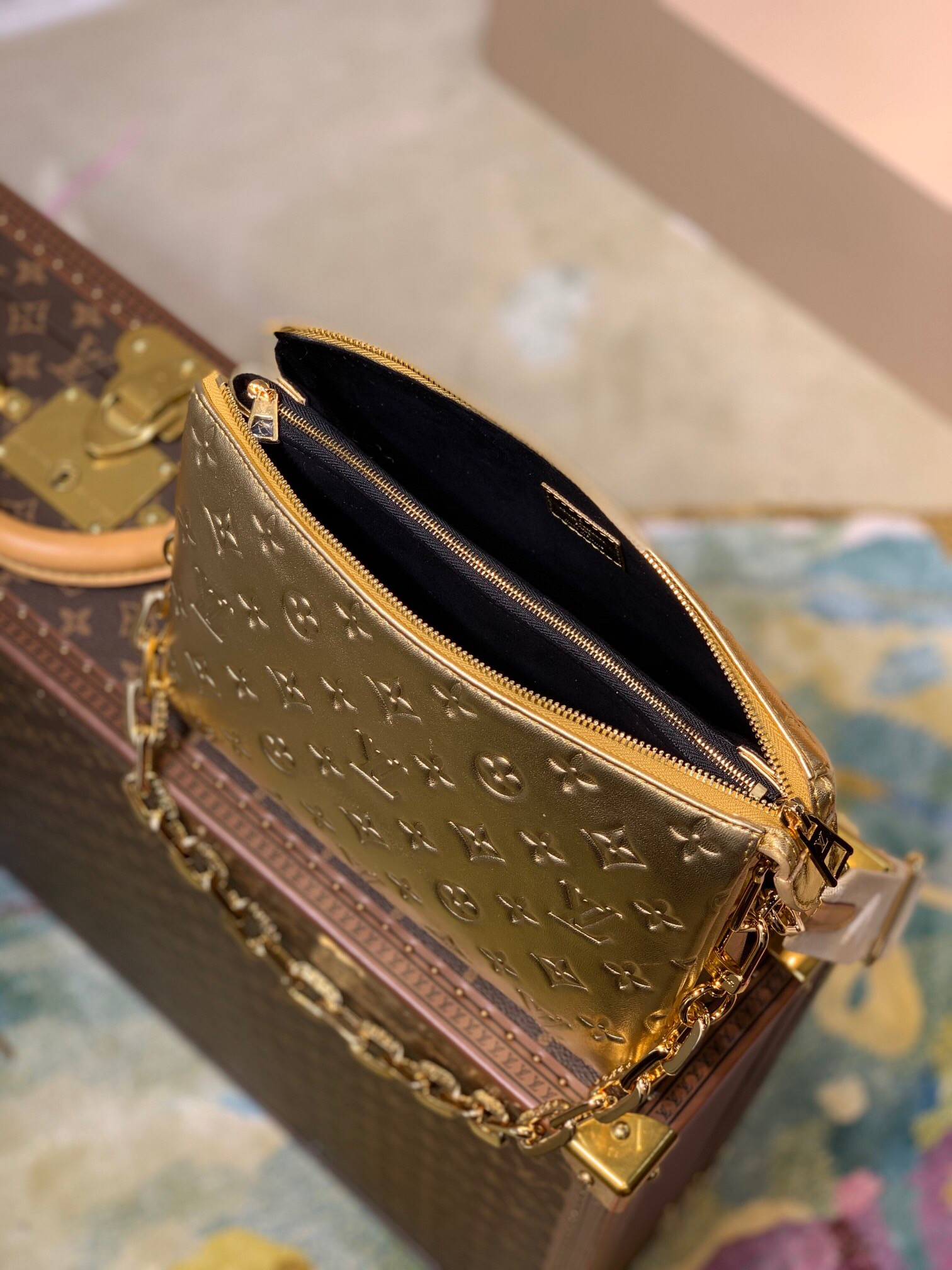 LV COUSSIN PM in Gold M59278